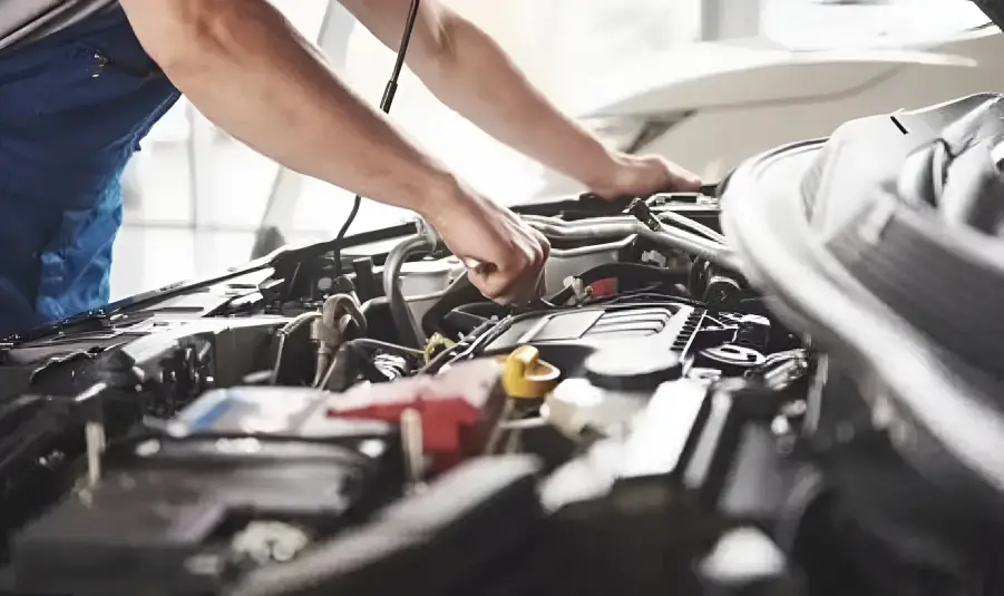 Regular car servicing inspection by professional mechanic